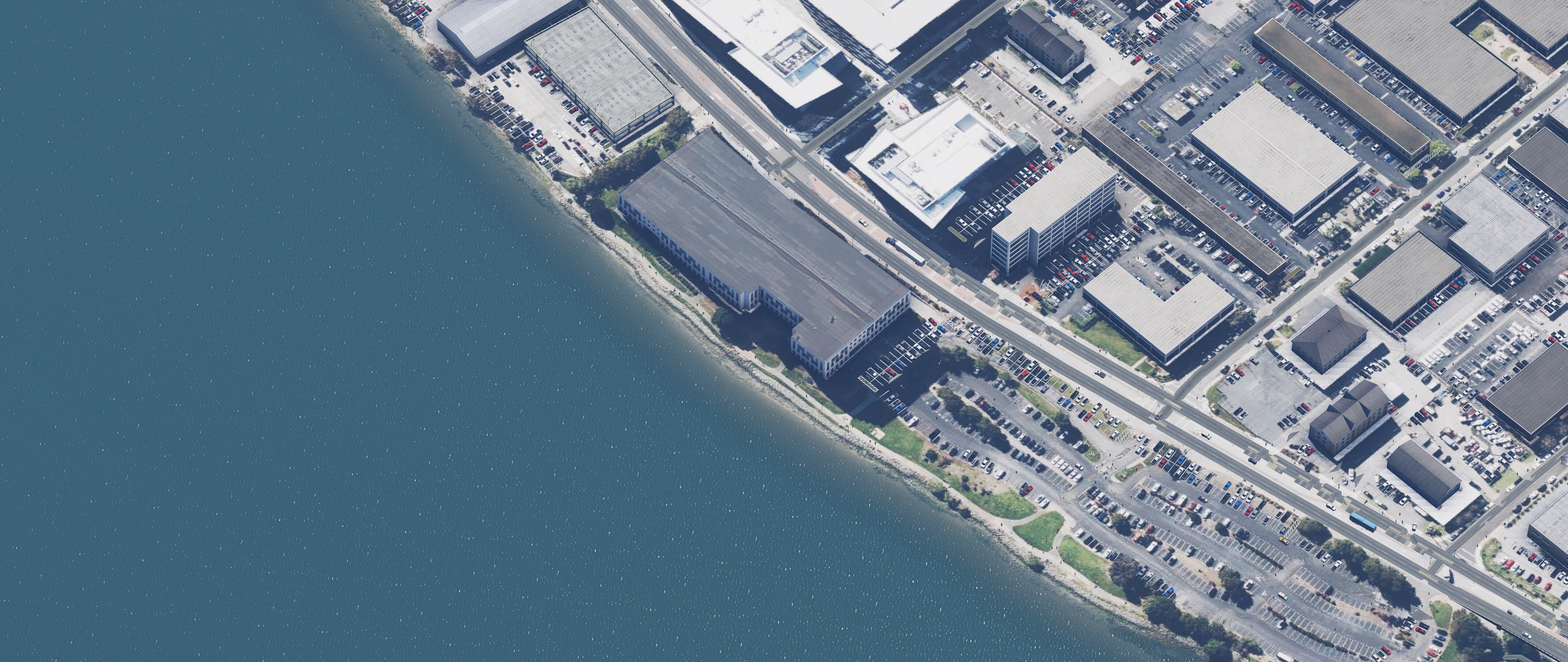 Screenshot from X-Plane showing a clear daytime view of the San Francisco Bay shoreline near SFO airport.
